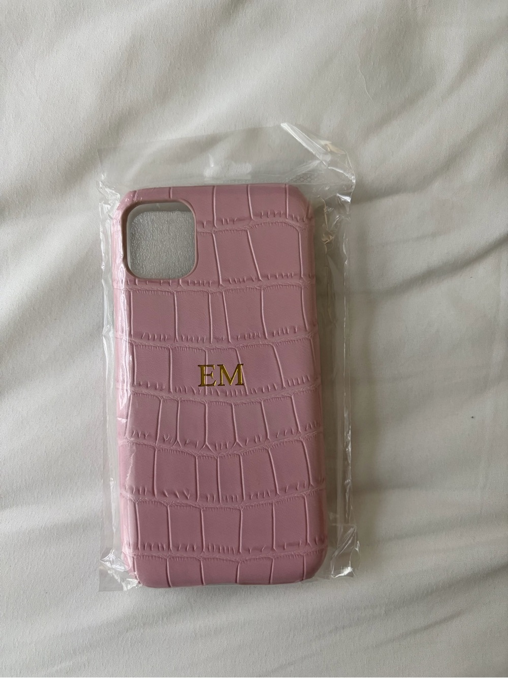Pink iphone case with gold monogram